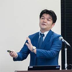 松本修氏